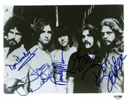 The Eagles: Group Signed 8" x 10" Black & White Photograph w/ Hotel California Members! (PSA/DNA)