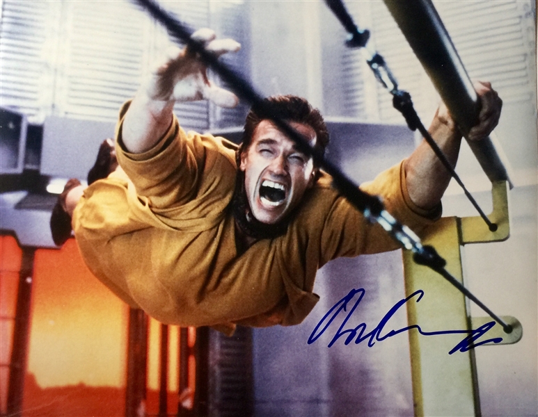 Arnold Schwarzenegger In-Person Signed 11" x 14" Color Photo from "Total Recall" (Beckett/BAS Guaranteed)