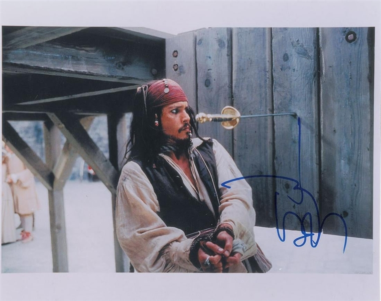 Johnny Depp Signed 13.5" x 10.75" Color Photo from "Pirates of the Caribbean" (John Brennan Collection)(Beckett/BAS Guaranteed)
