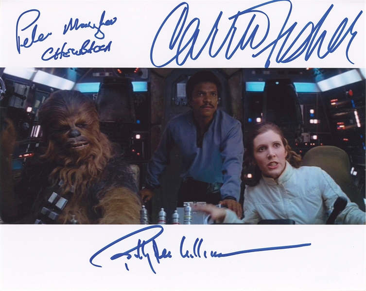 Star Wars: Carrie Fisher, Peter Mayhew, and Billy Dee Williams Signed 10” x 8” Photo from “The Empire Strikes Back” (Beckett/BAS Guaranteed)