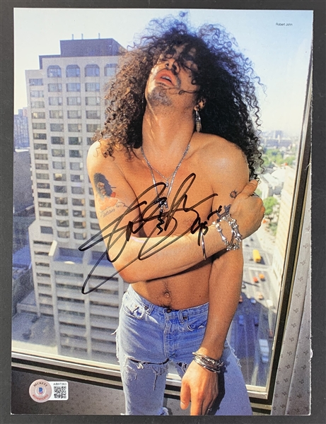 Slash Signed 8" x 10.75" Magazine Photo (Beckett/BAS LOA)(Steve Grad Autograph Collection)