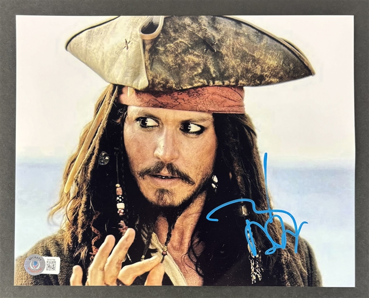 Johnny Depp Signed 8" x 10" Pirates of the Caribbean Photograph (Beckett/BAS)