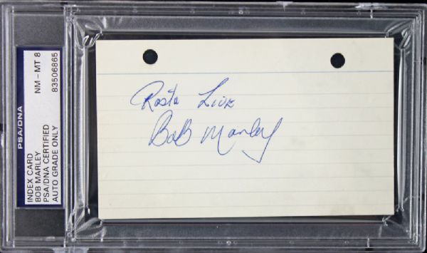 Bob Marley Signed 3" x 5" Album Page w/ Exceptional Signature & Clean Medium! (PSA/DNA Encapsulated)