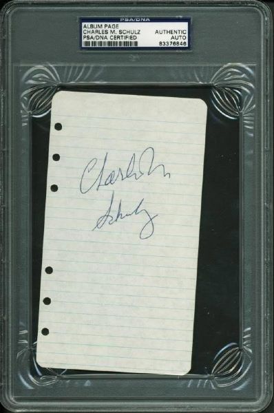 Peanuts: Charles Schulz Signed 3.75" x 6.75" Notebook Page (PSA/DNA Encapsulated)