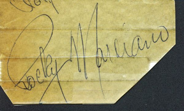 Rocky Marciano Signed 2" x 3" Vintage Album Page (PSA/JSA Guaranteed)