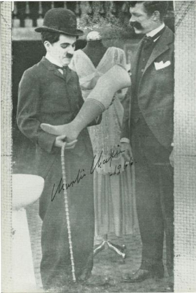 Charlie Chaplin Signed 3" x 6" Magazine Photograph As The Tramp! (JSA)