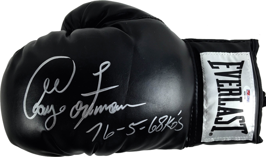 George Foreman Signed Black Everlast Boxing Glove with RARE "76-5, 68 KOs" Inscription (PSA/DNA)