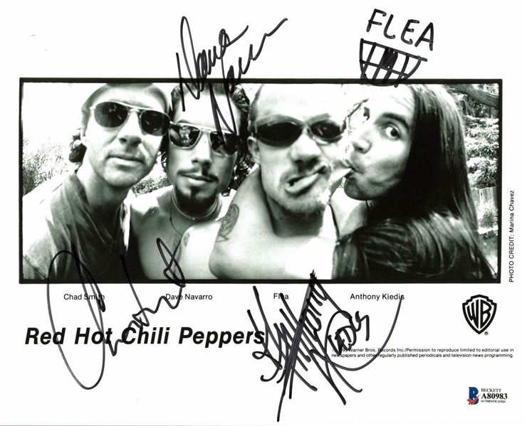 Red Hot Chili Peppers Group Signed 8" x 10" Promotional Photo (BAS/Beckett)