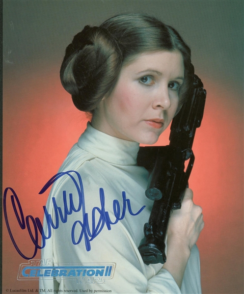 Carrie Fisher Signed Star Wars Celebration II 8" x 10" Blaster Color Photograph (Beckett/BAS Guaranteed)