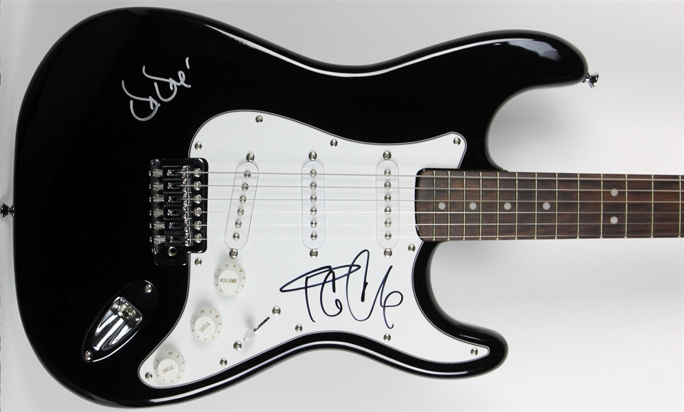 N.W.A.: Dr. Dre & Ice Cube Dual-Signed Fender Squier Stratocaster Guitar (BAS/Beckett)