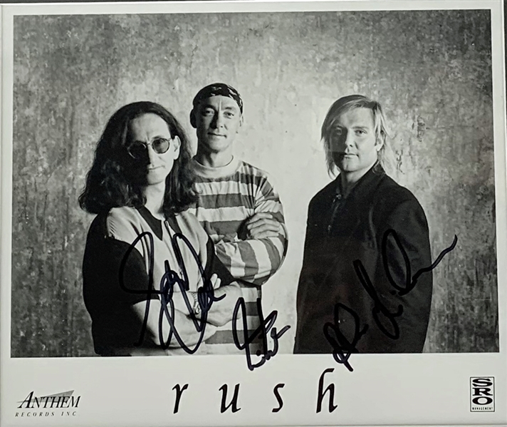 Rush Group Signed 8" x 10" Anthem Records Promotional Photograph (Beckett/BAS)