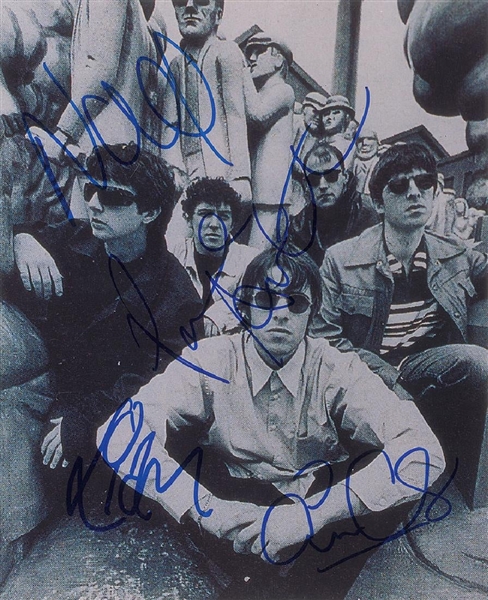 Oasis Group Signed 8" x 10" B&W Photo (John Brennan Collection)(Beckett/BAS Guaranteed)