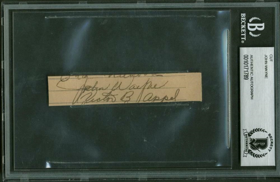 John Wayne Vintage Signed 1" x 3" Notebook Page Cut (Beckett/BAS Encapsulated)
