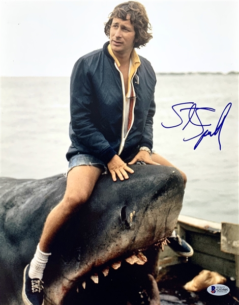 Steven Spielberg Awesome Signed 11" x 14" Color Photo Riding Jaws! (Beckett/BAS COA)