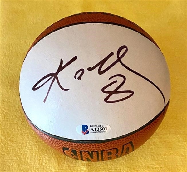 Kobe Bryant Signed Spalding NBA Mini Basketball with Exact Signing Proof! (Beckett/BAS LOA)