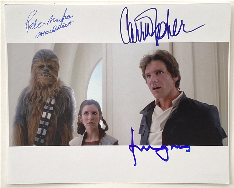 Star Wars: Harrison Ford, Carrie Fisher, and Peter Mayhew 10” x 8” Fantastic Signed Photo from “The Empire Strikes Back” (Beckett/BAS Guaranteed)