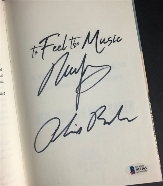 "To Feel The Music" Hardcover book signed by Neil Young and Phil Baker (Beckett/BAS)