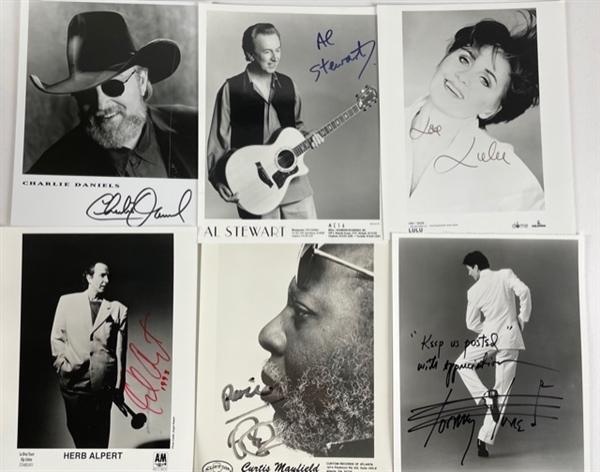 MUSICAL LEGENDS: Group Lot of 43 Photographs, all 8"x10"and individually signed, including Bill Wyman, Charlie Daniels, Herb Alpert, Eddie Fisher, Chuck Negran, LuLu, Curtis Mayfield and MORE!