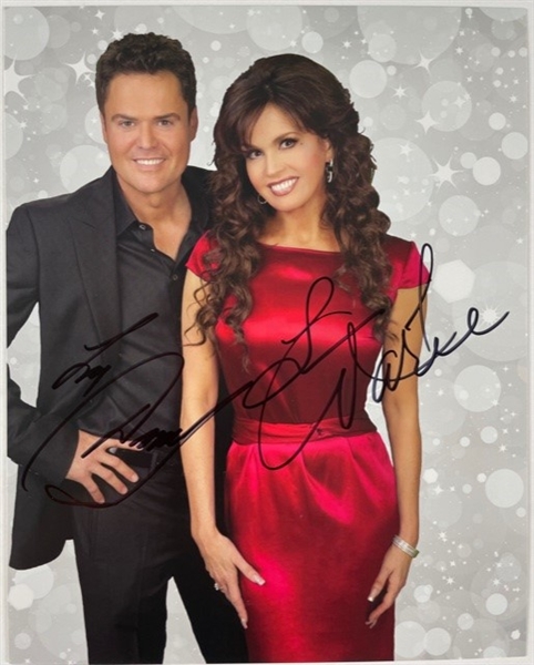 Donnie & Marie Osmond Signed 8" x 10" Color Photograph (Beckett/BAS Guaranteed)