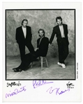 Genesis 1990s Group Autographed Virgin Records Promotional Photograph (3 Sigs) (UK) (Tracks COA) 