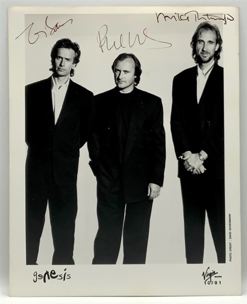Genesis 1990s Group Autographed Virgin Records Promotional Photograph (3 Sigs) (Third Party Guaranteed)