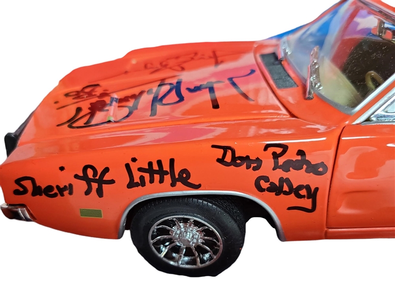 Dukes of Hazzard Cast Autographed 1:18 Scale Die-Cast General Lee Car (9 Sigs)(Beckett/BAS)(Celebrity Authentics)