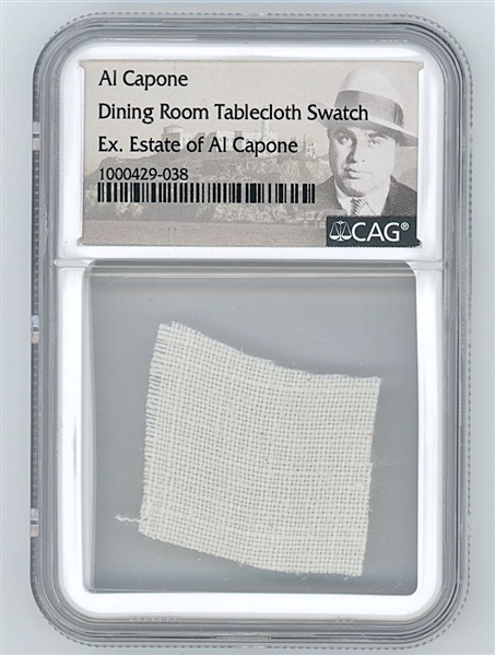 Al Capone’s Personally Owned Dining Room Tablecloth Swatch (CAG Encapsulated; Ex. Estate Of Al Capone) (Provenance: His Granddaughter Barbara Mae Capone)