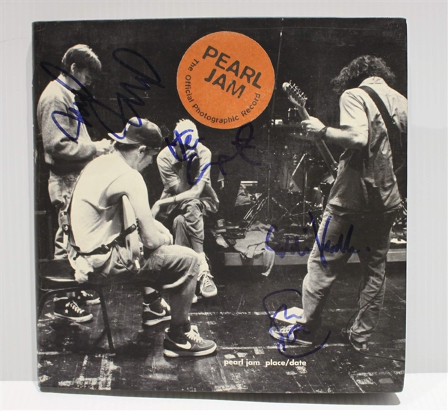 Rare vintage Pearl Jam signed photographic record book with Vedder, Goddard, Ament & McCready (Third Party Guaranteed)