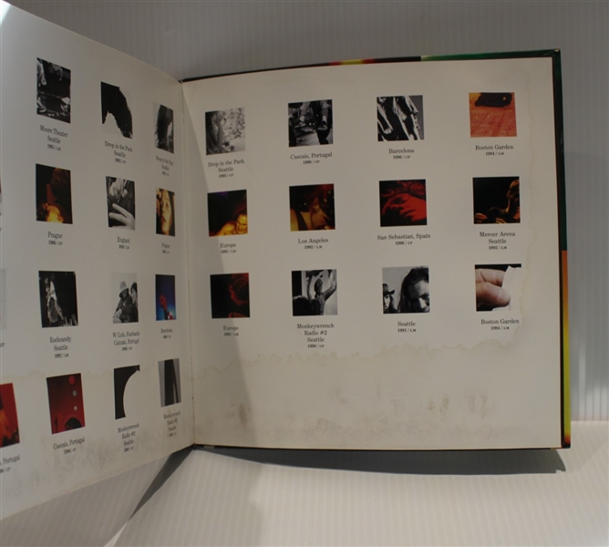 Rare vintage Pearl Jam signed photographic record book with Vedder, Goddard, Ament & McCready (Third Party Guaranteed)