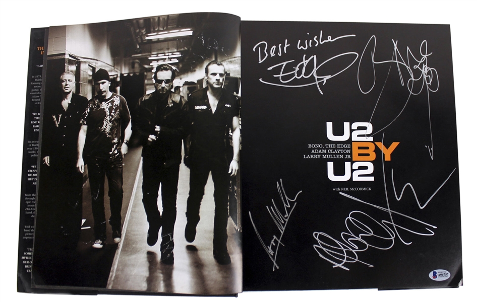 U2 Group Signed U2 By U2 Hardcover Book (BAS/Beckett)