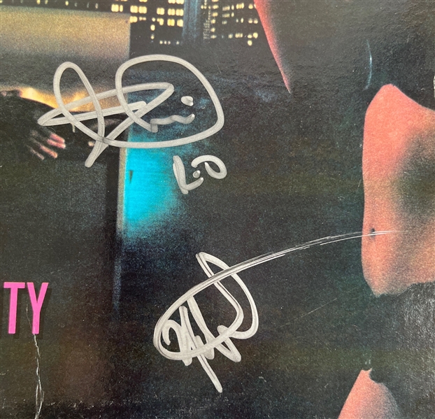 REO SPEEDWAGON Group Signed Hi Infidelity Album (4 Sigs)(Beckett/BAS)
