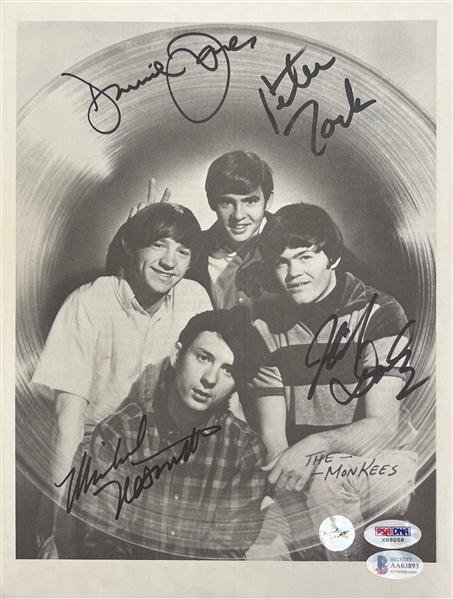 The Monkees: Fully Group Signed 8" x 10.75 Magazine Photo (Beckett/BAS LOA)