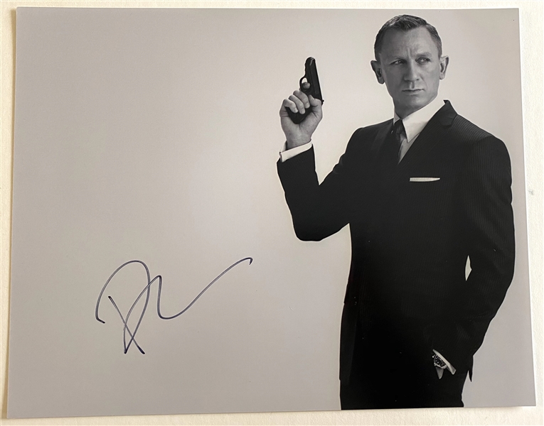 James Bond: Daniel Craig In-Person Signed 14” x 11” Photo (JSA Authentication)