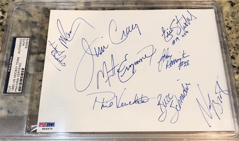 Miracle on Ice 8” x 6” Team Signed Cut w/ Herb Brooks (9 Sigs) (PSA Encapsulated) 