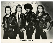 Thin Lizzy Group Signed 10” x 8” Promotional Photograph (4 Sigs) (UK) (Tracks COA) 