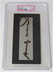 Andy Warhol Signed 4" x 7" Segment (PSA/DNA Encapsulated)(JSA LOA) 