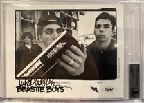 The Beastie Boys Group Signed Capitol Records 8" x 10" Promotional Photograph (3 Sigs)(Beckett/BAS Encapsulated)