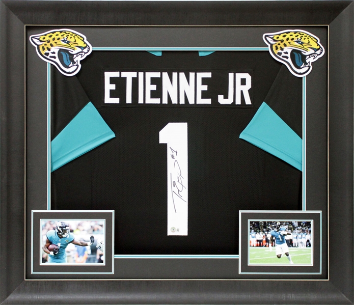 Travis Etienne Signed Jaguars Jersey in Custom Framed Display (Beckett/BAS Witnessed)