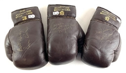 Lot of 3 Signed Boxing Gloves  including Breland, Ryan, and Rooney (Beckett/BAS)