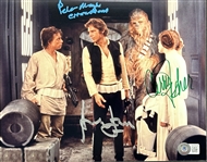 Star Wars: Harrison Ford, Carrie Fisher & Peter Mayhew Cast Signed Photo from A New Hope (Beckett/BAS LOA)